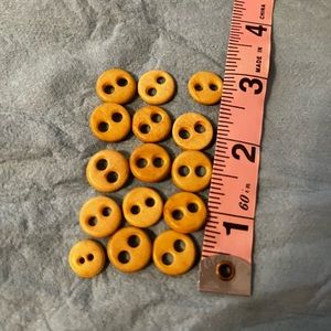 Scrimshaw hand carved buttons.